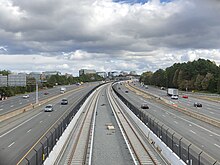 The Dulles Toll and Access Roads and the Silver Line of the Washington Metro in Reston 2018-10-29 13 59 27 View east along Virginia State Route 267 (Dulles Toll and Access Roads) and the Silver Line of the Washington Metro from the overpass for Virginia State Route 286 (Fairfax County Parkway) in Reston, Fairfax County, Virginia.jpg