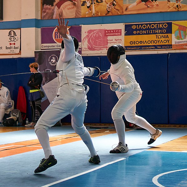 File:2nd Leonidas Pirgos Fencing Tournament. The fencer Stelios Foustanakis scores a touch.jpg