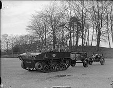 Vickers Light Dragon Mark II tractor towing a 3.7 inch howitzer on Carriage Mk IV and limber. 3.7inchHowitzerTowedByLightDragonTractor.jpg