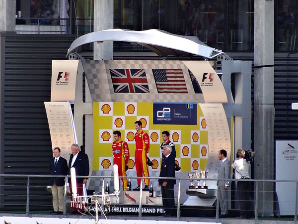 Rossi on the podium after winning a GP2 series race at Spa-Francorchamps in 2015