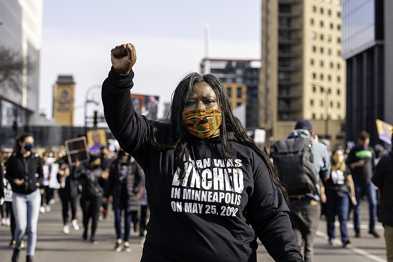 File:Attorney and civil rights activist, Nekima Levy Armstrong, leads a silent march for justice for George Floyd in downtown Minneapolis, Minnesota on the day before the beginning of the trial of Derek Chauvin (51013554148).jpg