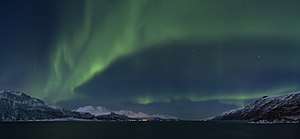 Aurora borealis above Lyngenfjorden, 2012 March.jpg