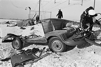 Dutch VW Transporter van, after an accident with a train on a level crossing in 1963. The van body is now some distance beyond the chassis. Auto-ongeluk bij Diemen, tegen trein. De wrakstukken, Bestanddeelnr 914-7378.jpg