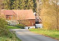 Ehemalige Mühle (Untere Rauner Mühle) mit Wohnhaus, daran angebautem Mühlengebäude und Seitengebäude