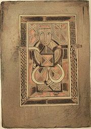 Keskiaikainen käsikirjoitus, jossa pienoiskoossa on hahmo ojennettuina käsivarsina.