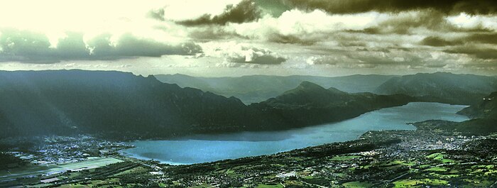 Panoramic view from Nivolet peak. Chambéry Airport is visible on the left, at the southern end of the lake, and Aix-les-Bains on the right