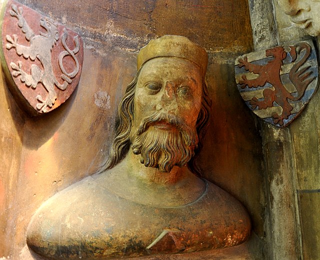 14th-century bust of John of Bohemia, St. Vitus Cathedral in Prague with the coat of arms of Bohemia and Luxembourg