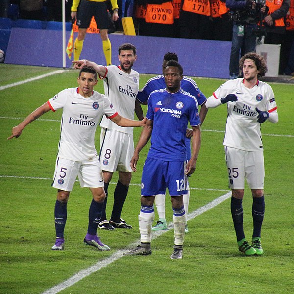 Marquinhos (in white, number 5) in a UEFA Champions League match against Chelsea in March 2016