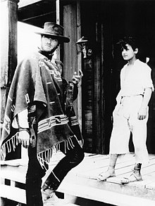 Clint Eastwood and Antoñito Ruiz in "For a Few Dollars More" (1965).jpg