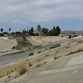 Tributary Sepulveda Creek enters Ballona; 405 freeway overpass and Baldwin Hills visible on right
