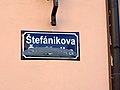 Vandalized bilingual street signs