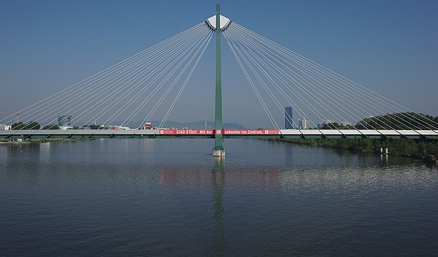 Donaustadtbrücke, Vienna, a metro bridge over the Danube with an advertisement for the metro prominently visible to motorists on the nearby bridge which the photo was taken from