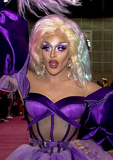 Ariel Versace is eliminated from the competition. Dragcon2-SAT-58 (47937164237) (cropped).jpg