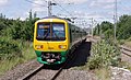 2012-07-23 12:23 London Midland 323243 departs Dudley Port.