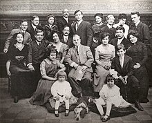 Group photograph of the Essanay Eastern Stock Company in Chicago, Illinois, 1911: Top row, left to right: Joseph Dailey, F. Doolittle, Inez Callahan, William J. Murray, Curtis Cooksey, Helen Lowe, Howard Missimer, Miss Lavalliet, Cyril Raymond. Middle row: Florence Hoffman, Harry Cashman, Alice Donovan, Frank Dayton, Harry McRae Webster (producer/director), Lottie Briscoe (leads), William C. Walters, Rose Evans. Bottom row: Eva Prout (Evebelle Ross Prout), Bobbie Guhl, Jack Essanay (dog), Charlotte Vacher, Tommy Shirley (Thomas P. Shirley). Essanay Eastern Players 1911.jpg