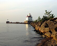 Fairport Harbor West Breakwater Light, Fairport Harbor viewed from the Headlands Dunes State Nature Preserve Fairport Harbor West Breakwater Light.jpg