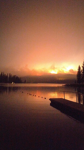 The Rice Ridge Fire became the nation's number one fire priority in early September when it blew up to cover over 100,000 acres (40,000 ha). Fire from Seeley Lake.jpg