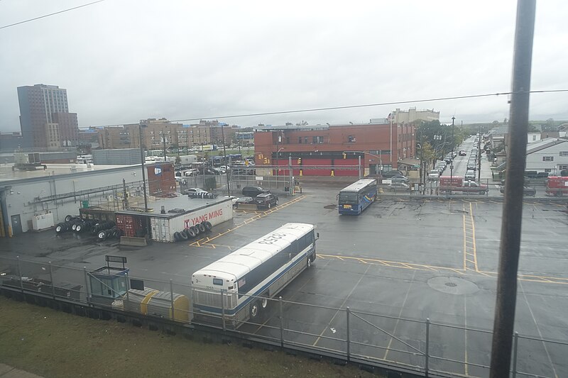 File:From the A Train td (2023-10-20) 003 - Far Rockaway Bus Depot, FDNY Engine 265 EMS 47.jpg