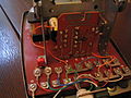 706 Telephone inside showing the reversible regulator mounted vertically and shown in circuit