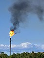 Gas flare on top of a flare stack at Preemraff Lysekil 1.jpg