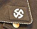 GSSN greatcoat - right collar tab (sunwheel swastika)