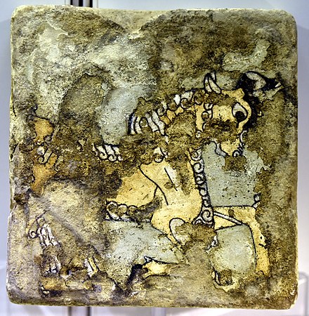 Glazed brick depicting a wild goat, from Nimrud, Iraq, 9th–7th century BCE. Iraq Museum