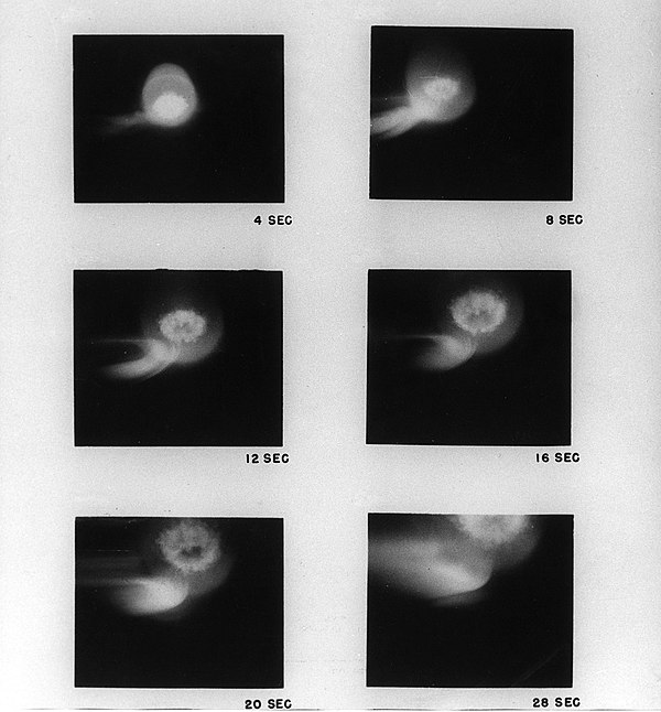 Late phases of TEAK fireball and formation of Northern Branch of Aurora as viewed from aircraft flying northwest of explosion.