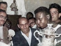 Egypt's captain Hanafy Bastan carrying the African Cup of Nations trophy in 1957 Hanafy Bastan 1957.jpg
