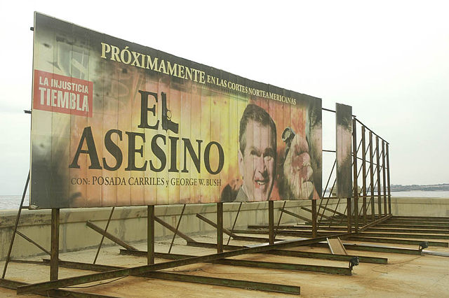 A billboard seen facing the US Interests Section (now US Embassy) in Feb. 2007, showing George W. Bush as "The Murderer"