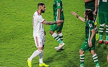 Iran's Ashkan Dejagah shaking hands with Iraq's Humam Tariq Iran & Iraq match by Amir Ostovari, 2019 AFC Asian Cup 7.jpg