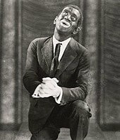 Al Jolson as a minstrel in The Jazz Singer (1927) Jolson black.jpg