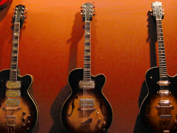 Kay's archtop electric guitars in 1961: (L to R) Swing Master K673, K672, Truetone Jazz King