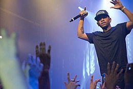 "Let Us Move On" features guest vocals from rapper Kendrick Lamar. Kendrick-lamar-1360479601.jpg