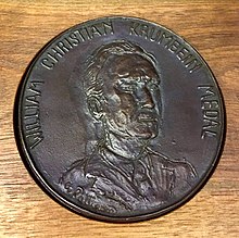 The Krumbein Medal awarded to Prof. E.J.M. Carranza in 2022 KrumbeinFront2022.jpg