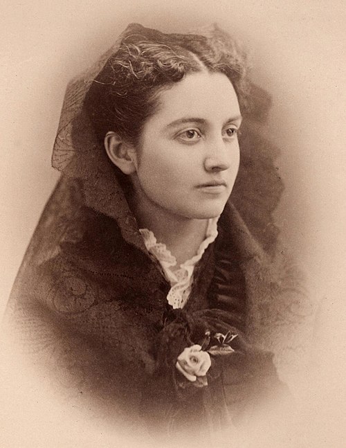 Mary Caffrey Low, the first female graduate of the college and valedictorian of the class of 1875.