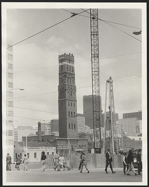 File:Melbourne City Loop Museum Station, now Melbourne Central, under construction 1974 with Coop's Shot Tower 2.jpg