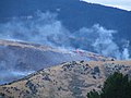 Some flame and smoke, during the Mt Allan forest fire near Dunedin in New Zealand
