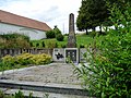 English: Memorial to those killed in the world wars in the village of Nedabyle, České Budějovice District, Czech Republic. Čeština: Pomník obětem světových válek v obci v obci Nedabyle, okres Českých Budějovice.