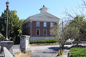 The building photographed from the St. Johns Bridge. North Precinct, St. John's, Portland, Oregon - rear 01.jpg