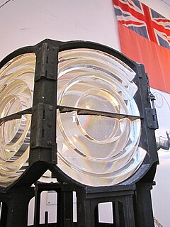 Pre-1983 optic from the Nab Tower; one of a pair, now on display inside Hurst Castle in Hampshire Optics (4865745080).jpg