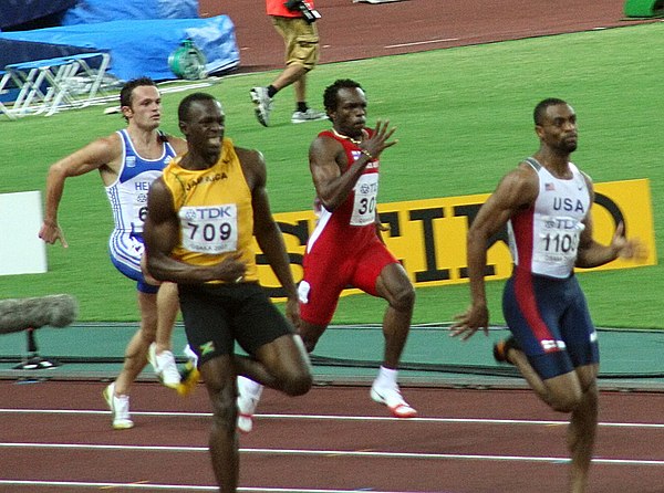 Bolt trailing behind Gay in the closing stages of the 200 m race, 2007