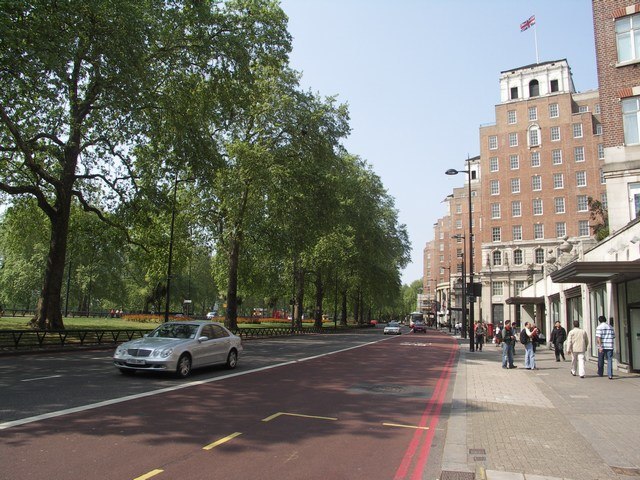 Looking north on Park Lane. Hyde Park is to the left; the Grosvenor House Hotel to the right.