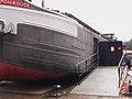 Die rivierboot Pompon Rouge, omgebou in tentoonstellingsruimte