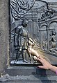 * Nomination Plaque in Charles Bridge, Prague, being touched by a tourist to bring good luck. -- Alvesgaspar 11:26, 30 November 2016 (UTC) * Promotion Good quality. --Smial 13:18, 30 November 2016 (UTC)