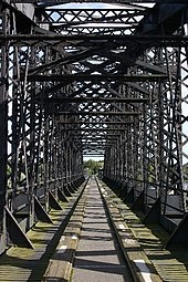 A nineteenth-century railway bridge over the River Spey, closed in 1965 and now part of the Moray Coast trail Railway bridge over the river Spey - geograph.org.uk - 59001.jpg