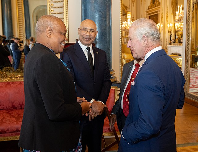 King Charles III speaking with Governor-General Dame Marcella Liburd at Buckingham Palace, 2023