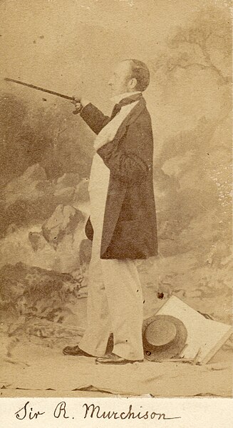 Roderick Impey Murchison posing with cane