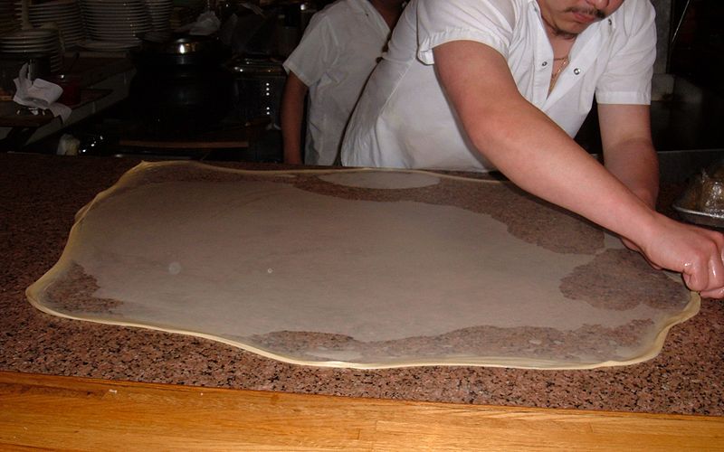 File:Roti canai being made.JPG