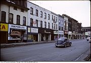 Row of shops south of Yonge Street and Yorkville Avenue, 1975. During the 1960s and 1970s, the area became the city's bohemian cultural centre.