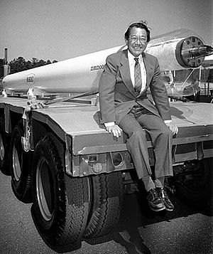 Satoshi Ozaki posed with a magnet for the Relativistic Heavy Ion Collider in 1991